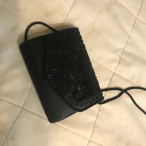 black uptown purse